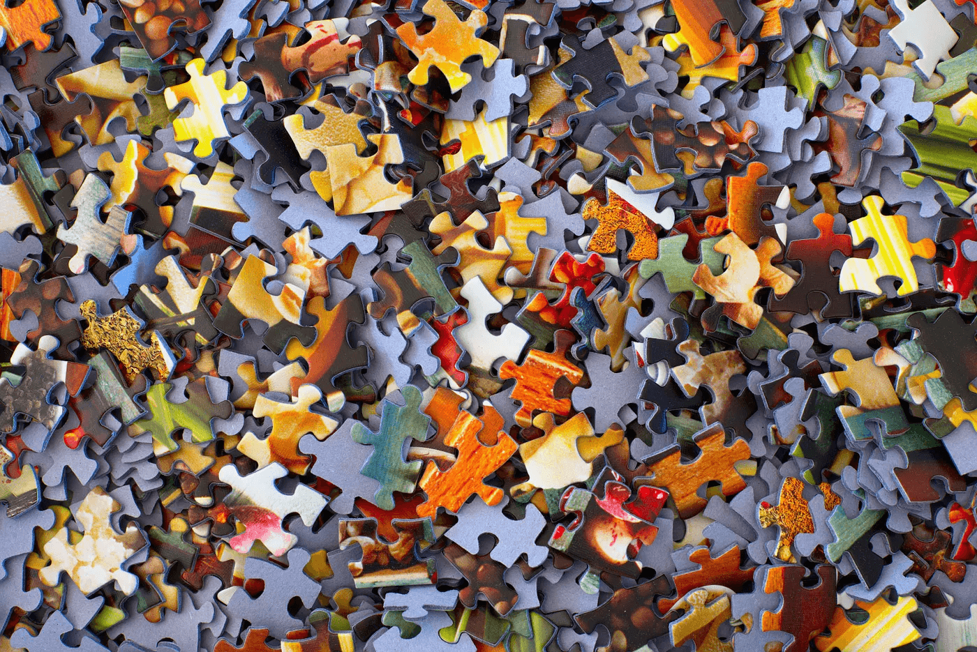 Scattered puzzle pieces